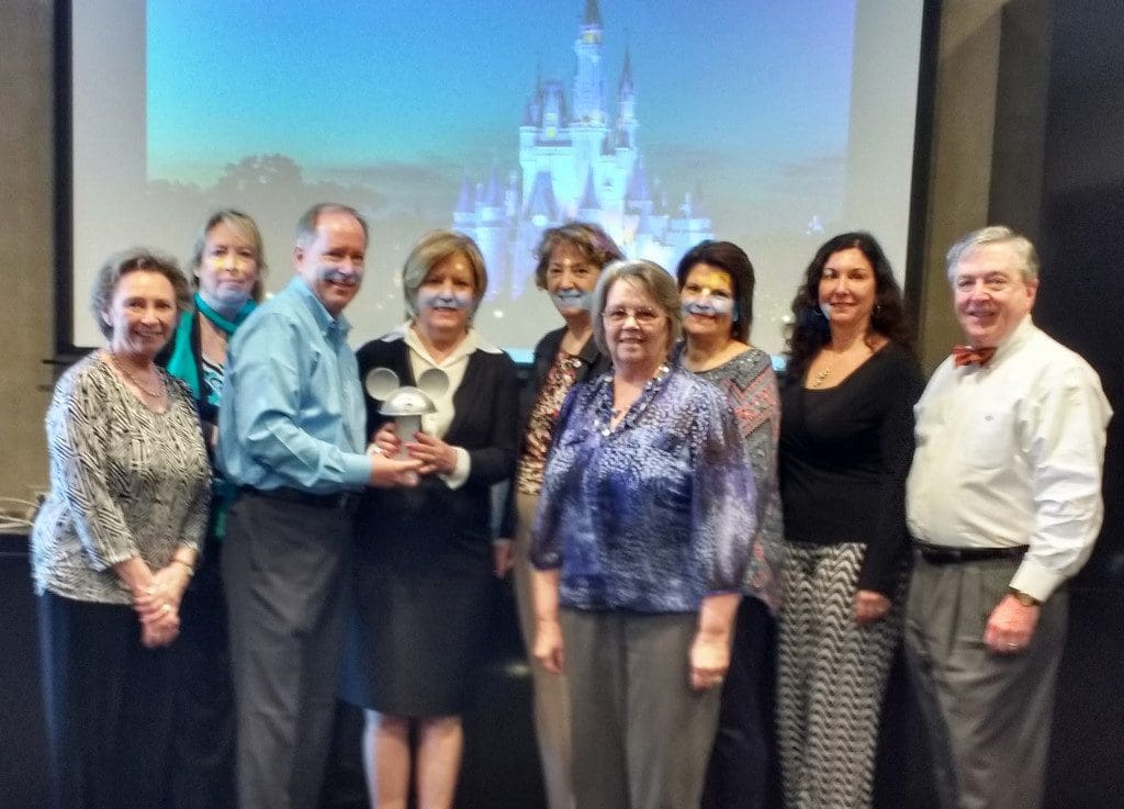 Covington Travel Accepts Disney Earmarked Silver Award